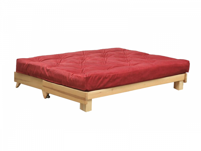 Futonová pohovka rozložena na postel